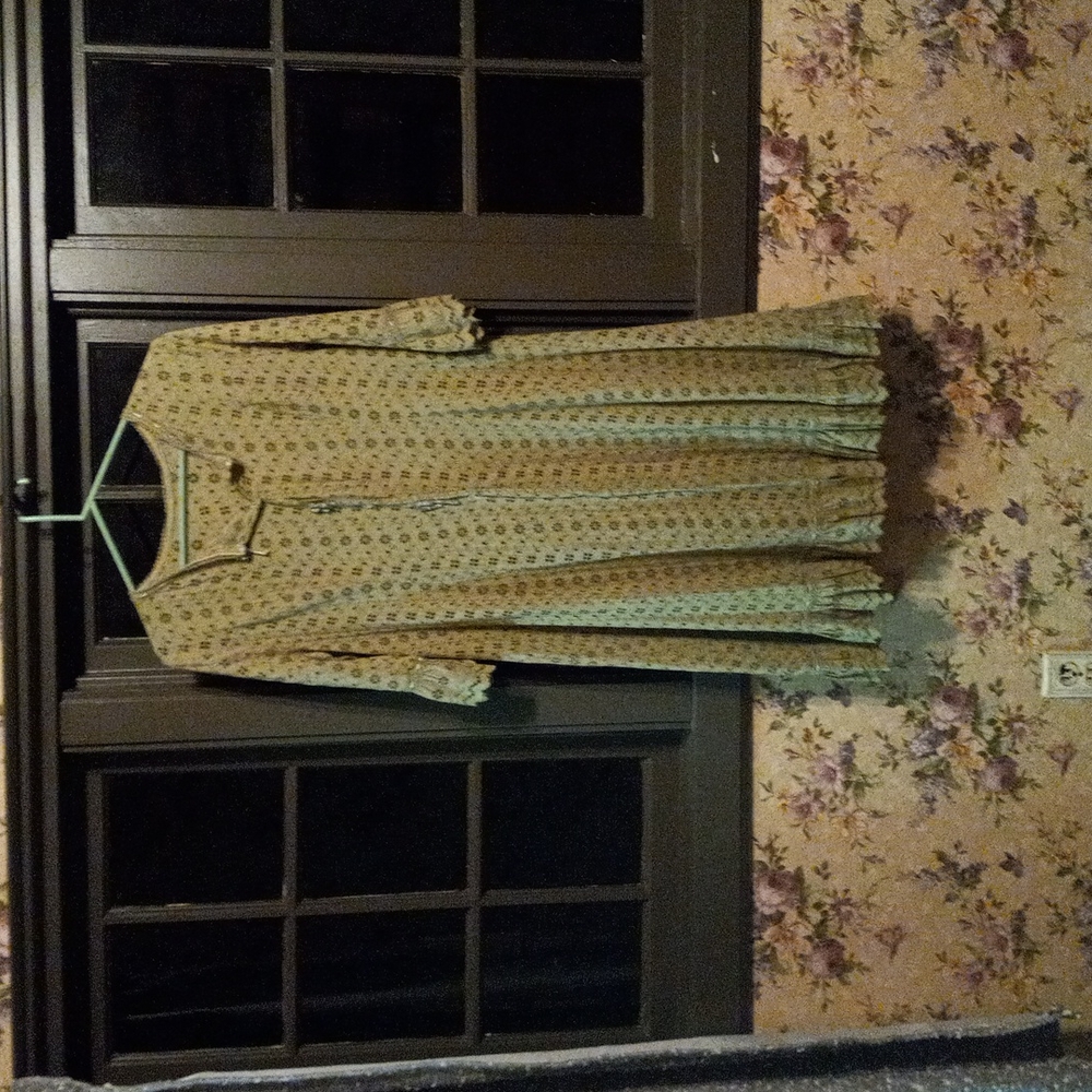 Vintage 1940s  olive green cotton eyelet dress with ruffles.